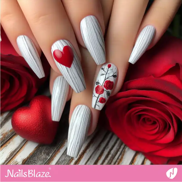 Elegant Red Rose Accent Nail Design