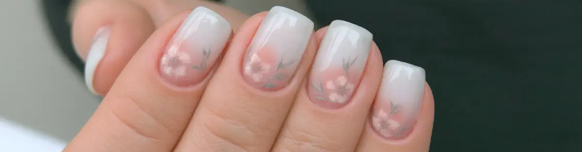Soft blush pink and cloud dancer floral nail design