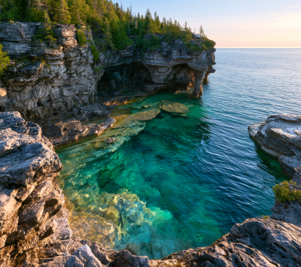 Clear turquoise waters and limestone sea caves of Georgian Bay at Bruce Peninsula