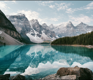Turquoise glacial lake and alpine peaks in the Alberta Rocky Mountains